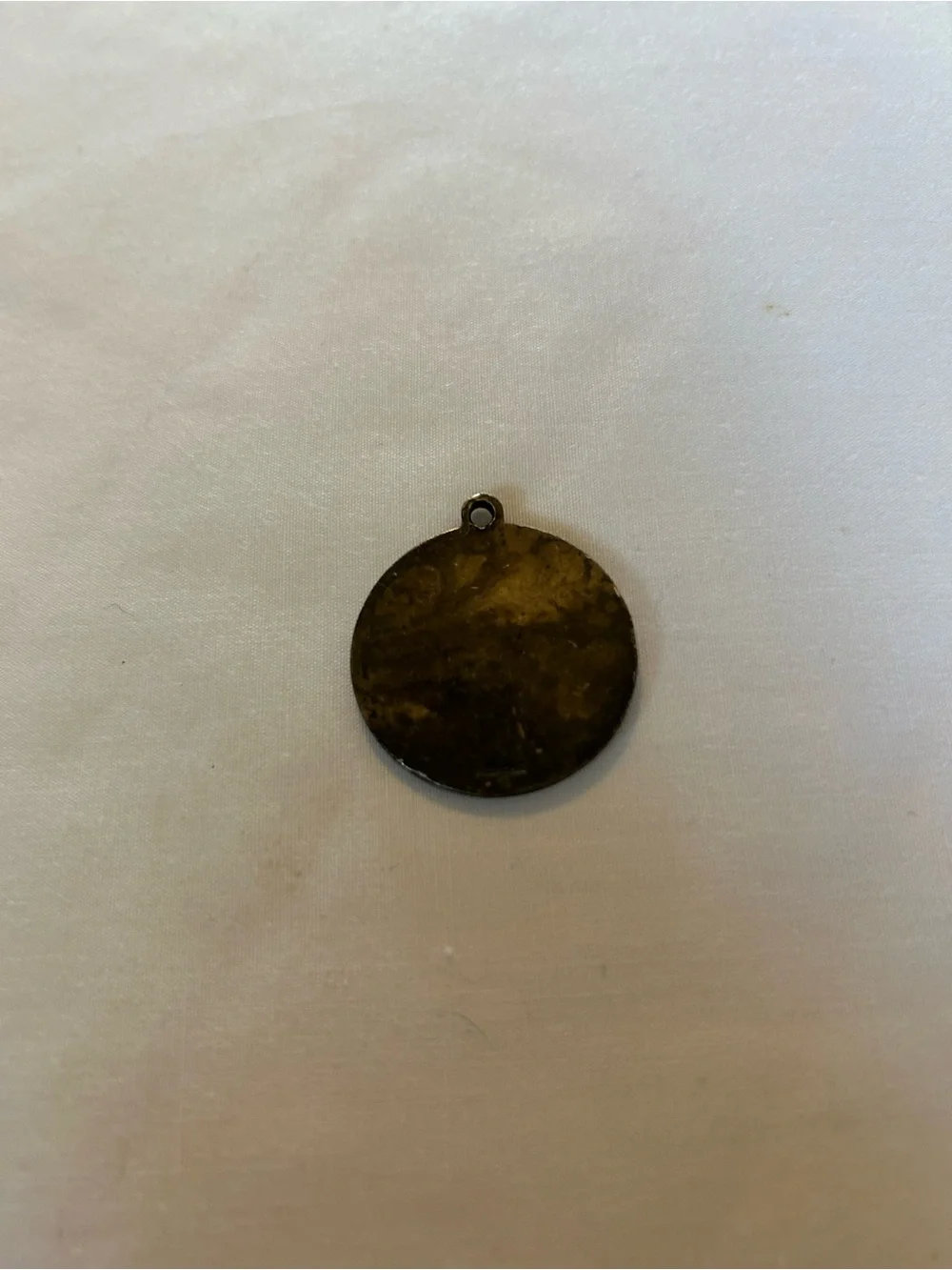 Unknown￼ gold tone